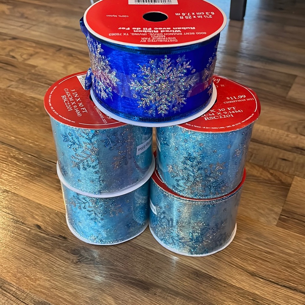 5 New rolls of blue Christmas ribbon